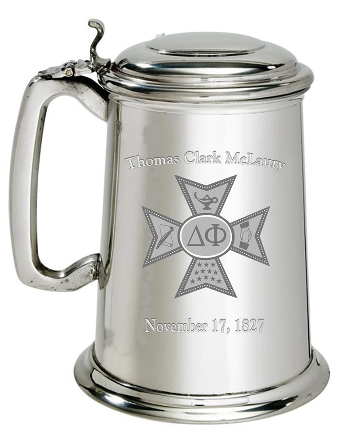 Product Description: Among the oldest traditions of the Fraternity, the glass bottomed pewter tankard can be seen at chapter houses across the country. Imported from England, each tankard is personally engraved so that you can be ready to fill the bumper with gladness and drink long life to Delta Phi.</br></br>Note: The engraving on the imageabove is not an exact representation. The maltese cross, name, and initiation date (or year) are all engraved on the pewter tankard. The school name is engraved on top of the tankard.</br></br>Domestic Shipping included.</br></br>Contact Delta Phi National if you wish to ship internationally.</br> Glass Bottomed Pewter Tankard
